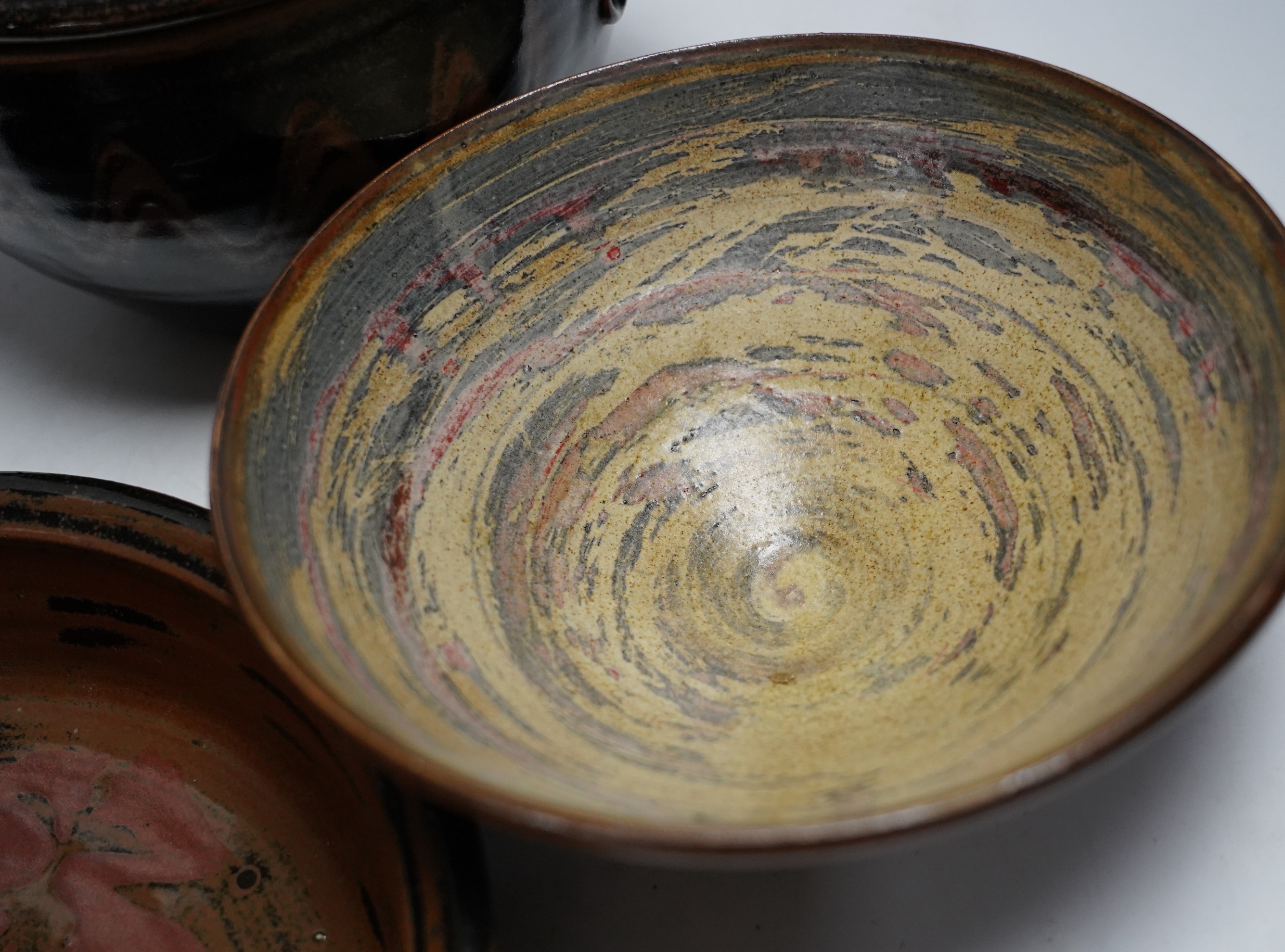 A David Melville studio stoneware pot and cover, a large dish and plate, largest 30cm diameter, a Raku ware pottery vase, a Leiard dish, a dish and a grey glazed vase, Raku vase 17.5cm high. Condition - varies, fair to g